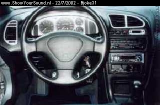 showyoursound.nl - Mazda 323F van BJ - Bjoke31 - dashboard.jpg - Foto van dashboard met een Aiwa CDC MP3 autoradio.