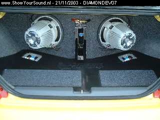 showyoursound.nl - Diamond Audio democar built & designed by Xtreme Car Concept - DIAMONDEVO7 - dscf0078.jpg - De amps met de afdekplaatjes er op.