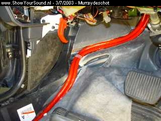 showyoursound.nl - ULTIMATE STEALTH  - The Legacy Lives On. By TEAM BOYDS. - murraydeschot - dsc00935-1.jpg - Coerd carefully cuts away the undercarpet to allow the two cables to sit flush under the carpet when replaced.  No lumps and bumps in this car then!